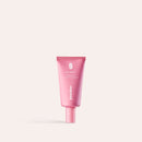 Rosafarbene Intimate-Prebiotic-Cream steht vor hellem Hintergrund.