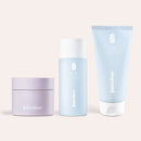 Clarifying Body Trio by juno&me: 2in1 AHA Body Scrub, Clarifying Body Wash and Clarifying Body Lotion side by side