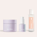 Body Crush Trio von juno&me: 2in1 AHA Body Scrub, Body Shaving Oil und Dry Touch Body Oil nebeneinander