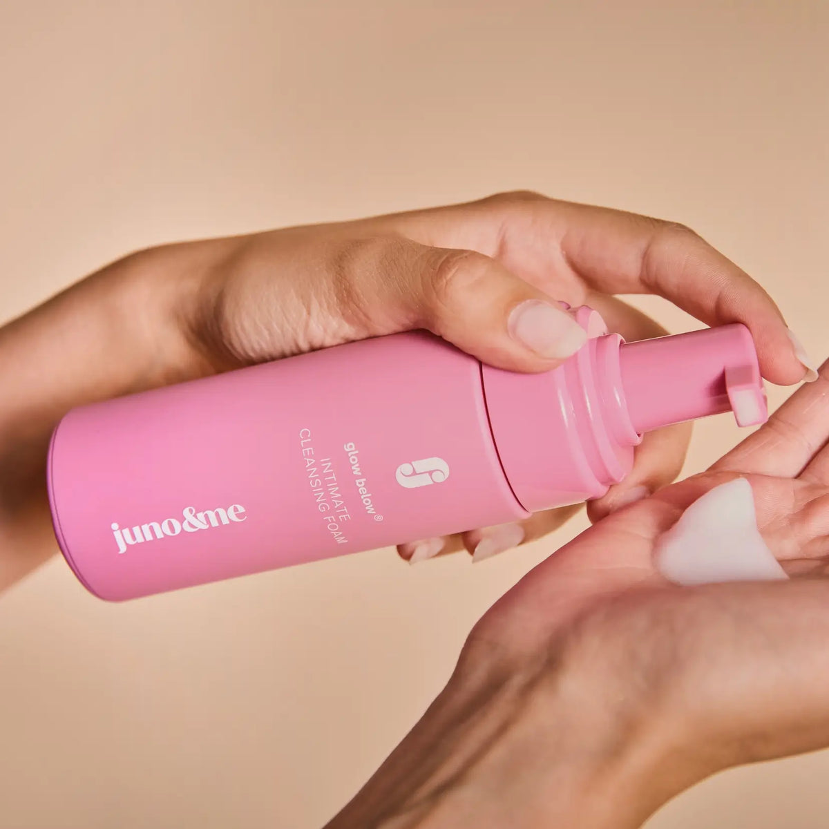 Intimate Cleansing Foam from the Happy Vulva Trio being pumped into a hand as foam